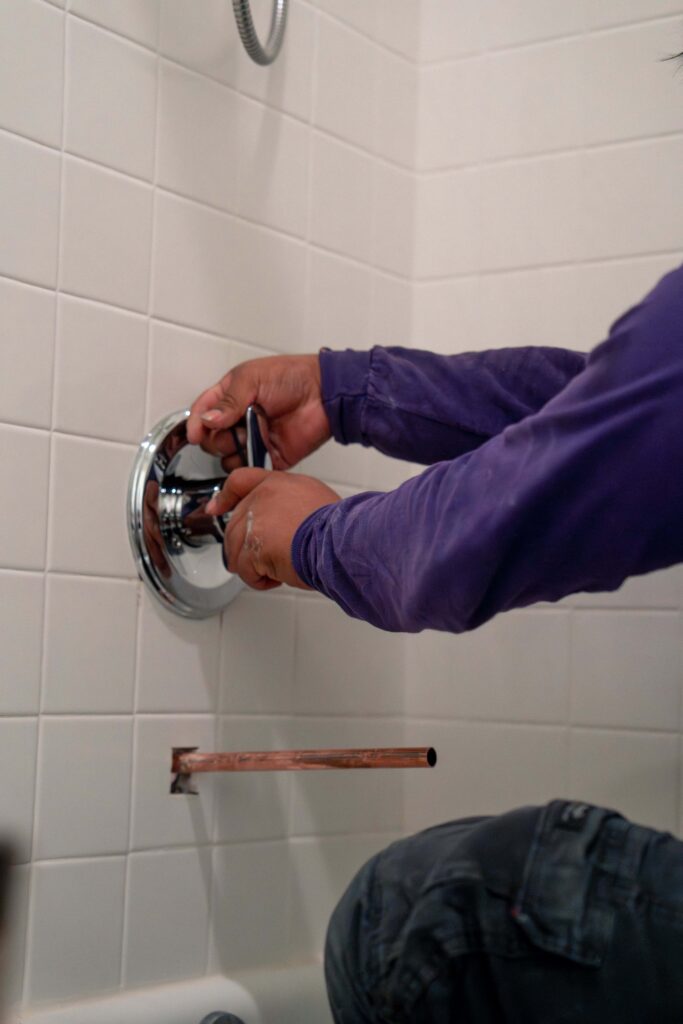 Pipe It Right plumber replacing a shower valve and piping for a shower