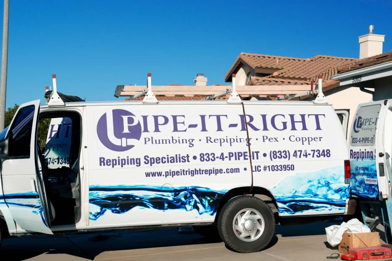 Pipe-It-Right Plumbing branded van side view at a residential job site