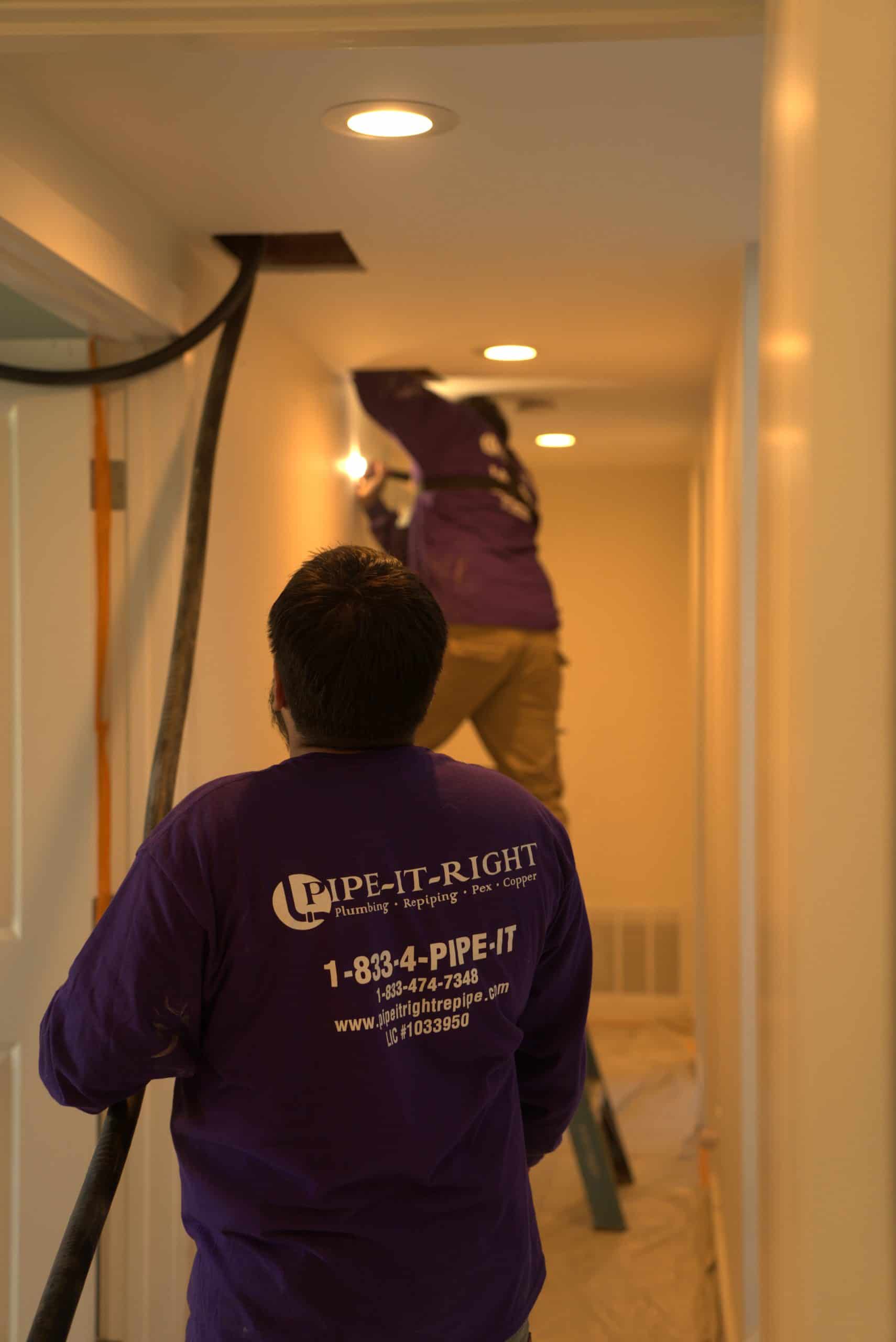 Pipe It Right Plumbing employees performing a repiping job in a home